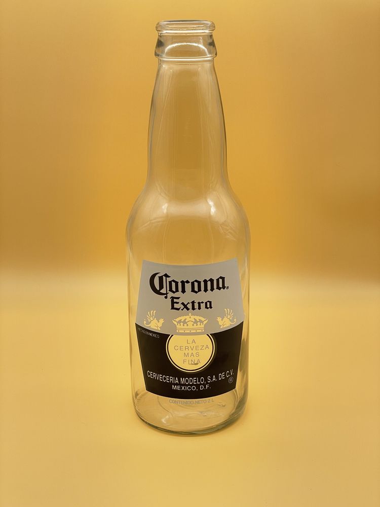 Große Corona Flasche aus Glas zur Dekoration